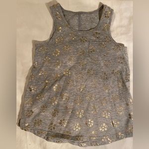 Gray and gold Cherokee tank top with slits on the sides